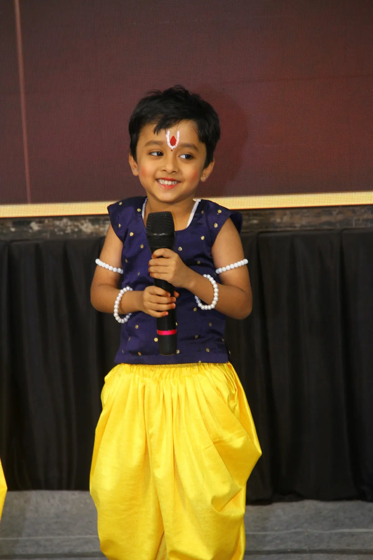 Annual Day: confident on the microphone